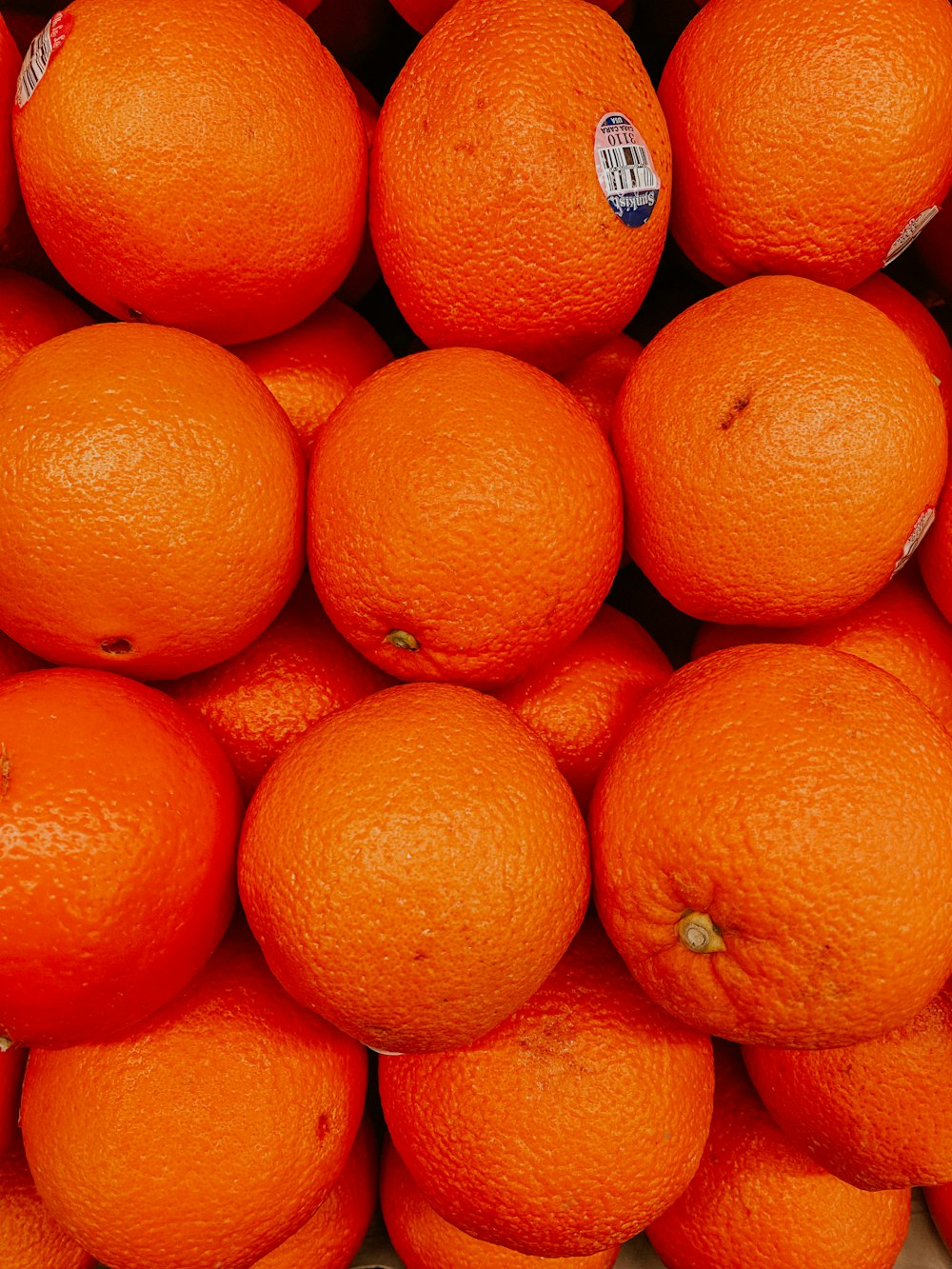 orange fruit on black surface