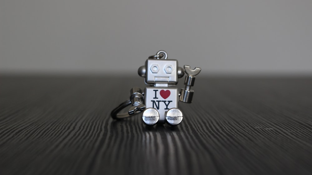 silver and black robot toy