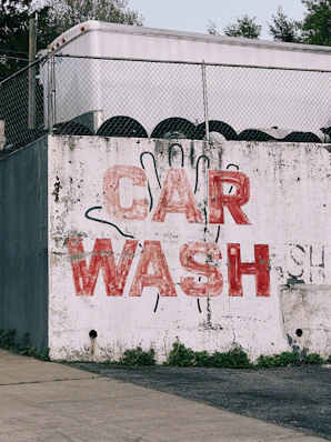 white and red love me love me wall graffiti