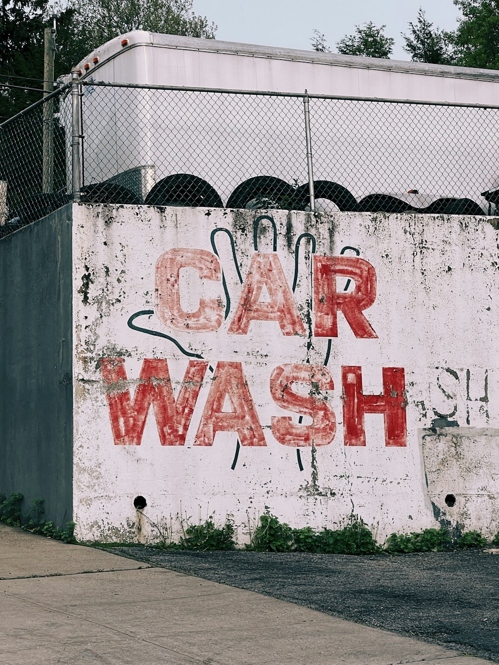 white and red love me love me wall graffiti