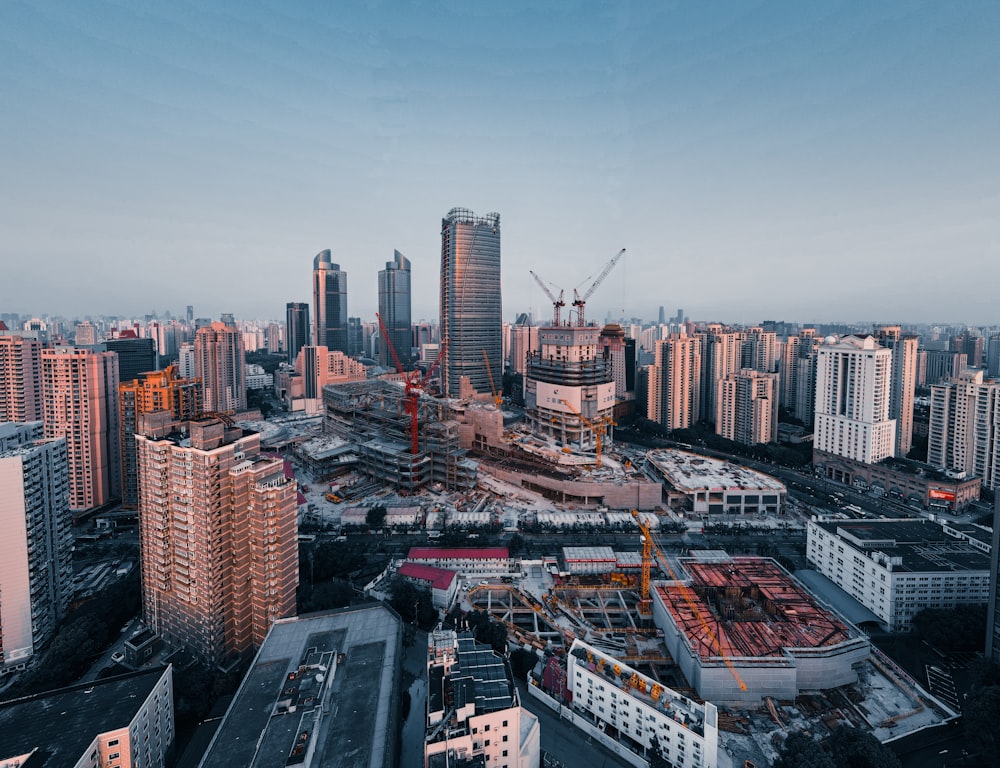 city skyline under blue sky during daytime