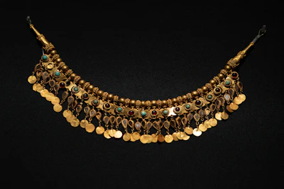 A vibrant handcrafted necklace with colorful beads and intricate details.