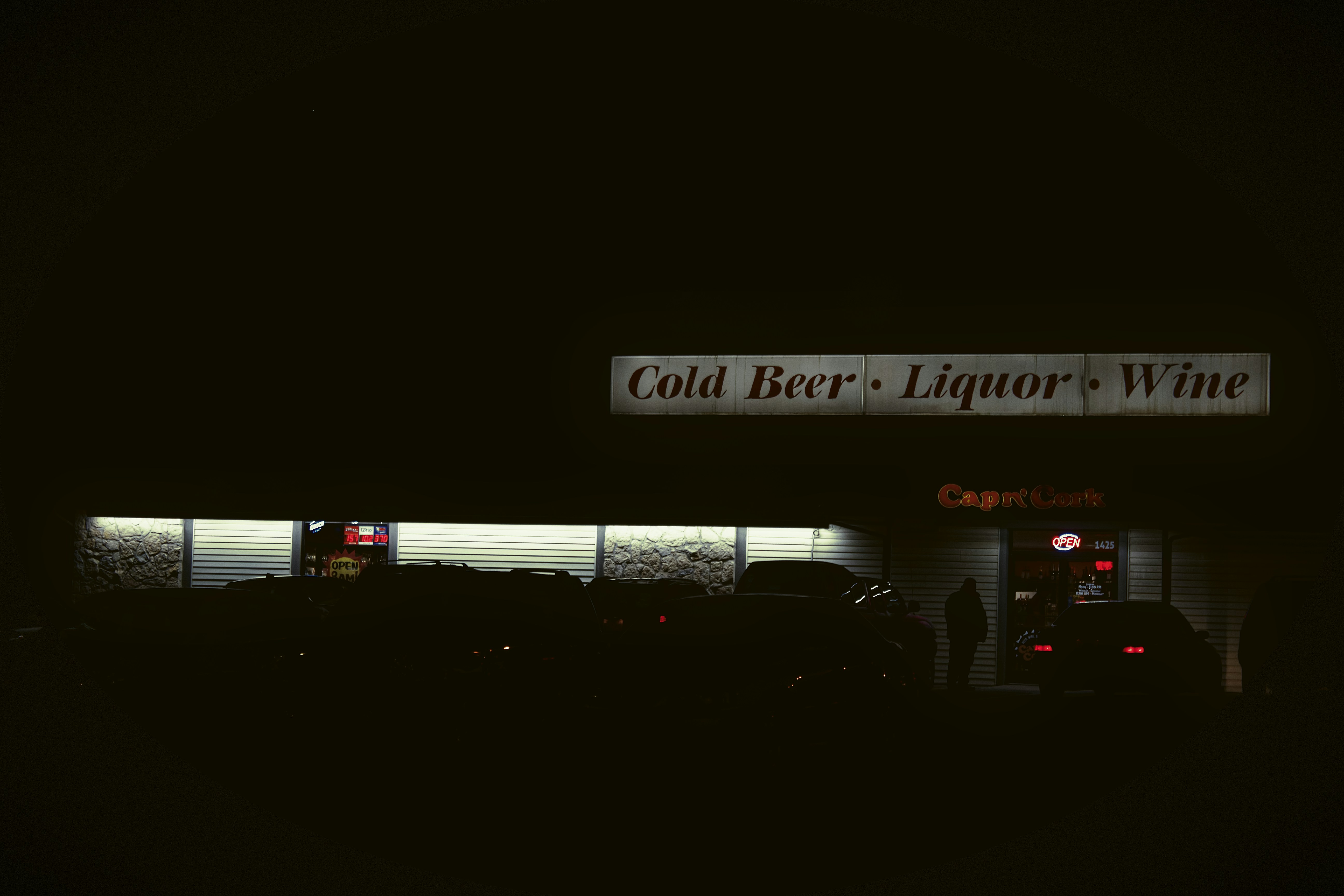 white and black train on track during nighttime