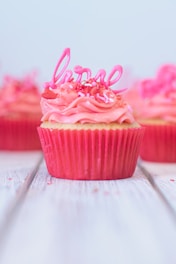 pink cupcake with pink icing on top