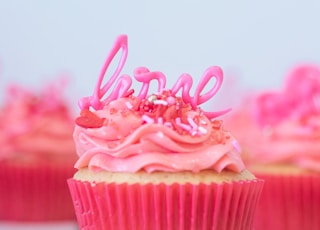 pink cupcake with pink icing on top