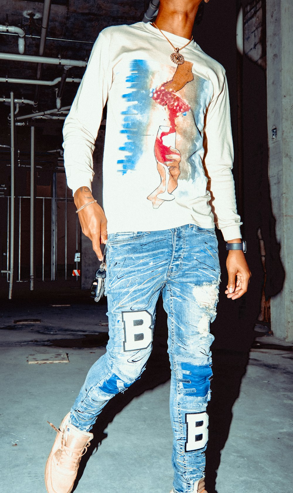 woman in white jacket and blue denim jeans with red and white paint on her face