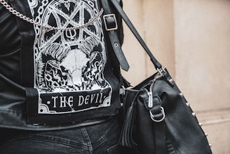 black and white leather backpack