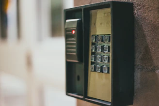 black and brown telephone booth