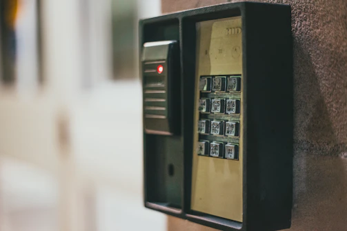 black and brown telephone booth