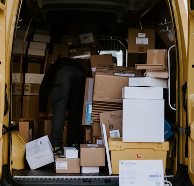 brown cardboard boxes on brown cardboard box