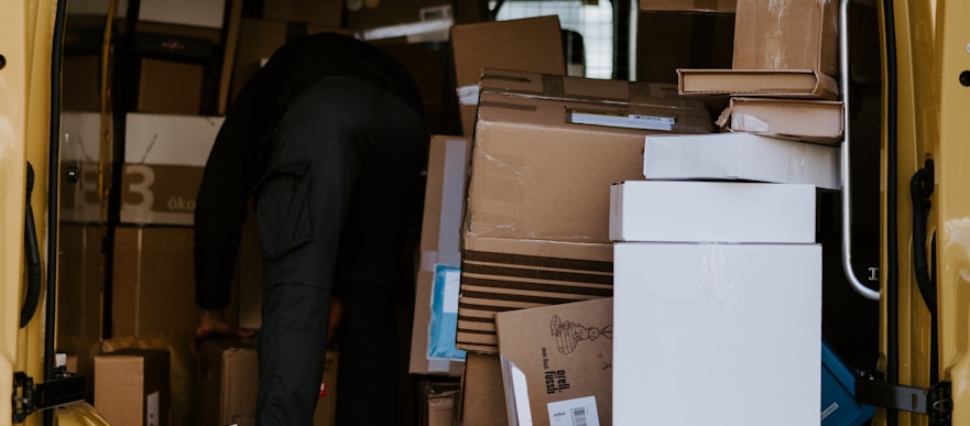 brown cardboard boxes on brown cardboard box