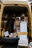 Delivery truck loaded with boxes heading out for nationwide shipping