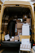 Delivery truck loaded with boxes heading out for nationwide shipping