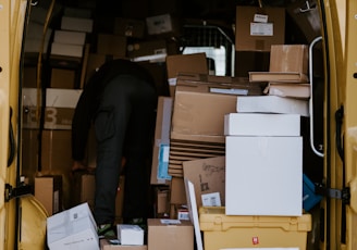 brown cardboard boxes on brown cardboard box