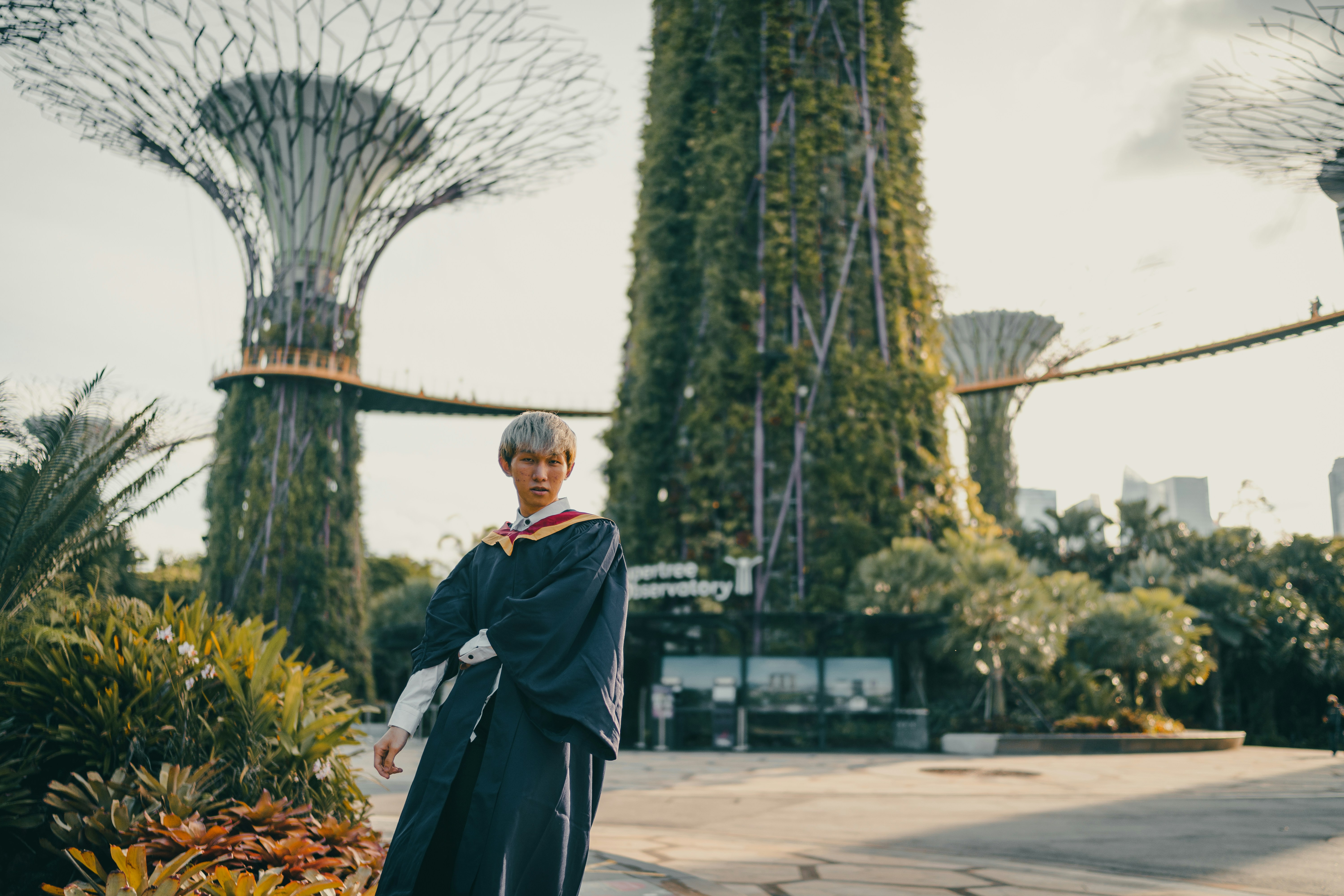 Portrait of David Kim, private university graduate struggling with debt