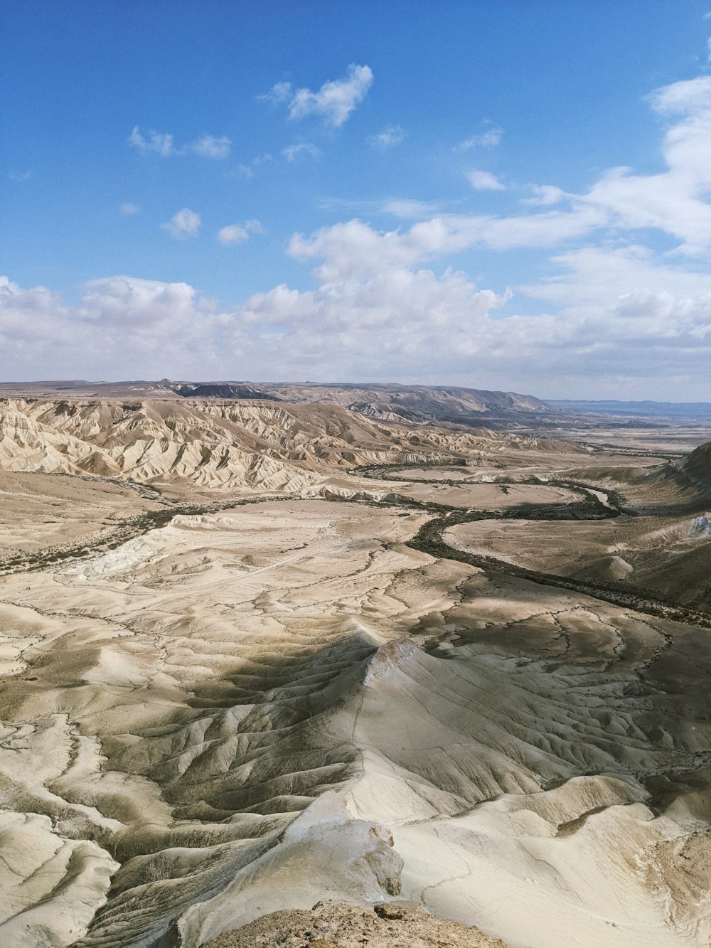 brown and gray mountains under blue sky during daytime