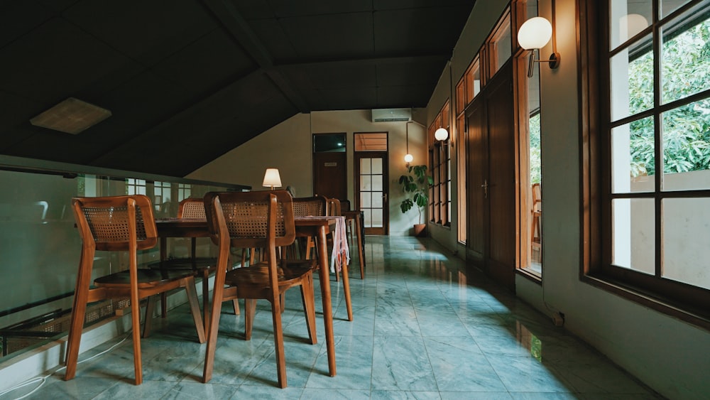 brown wooden table and chairs