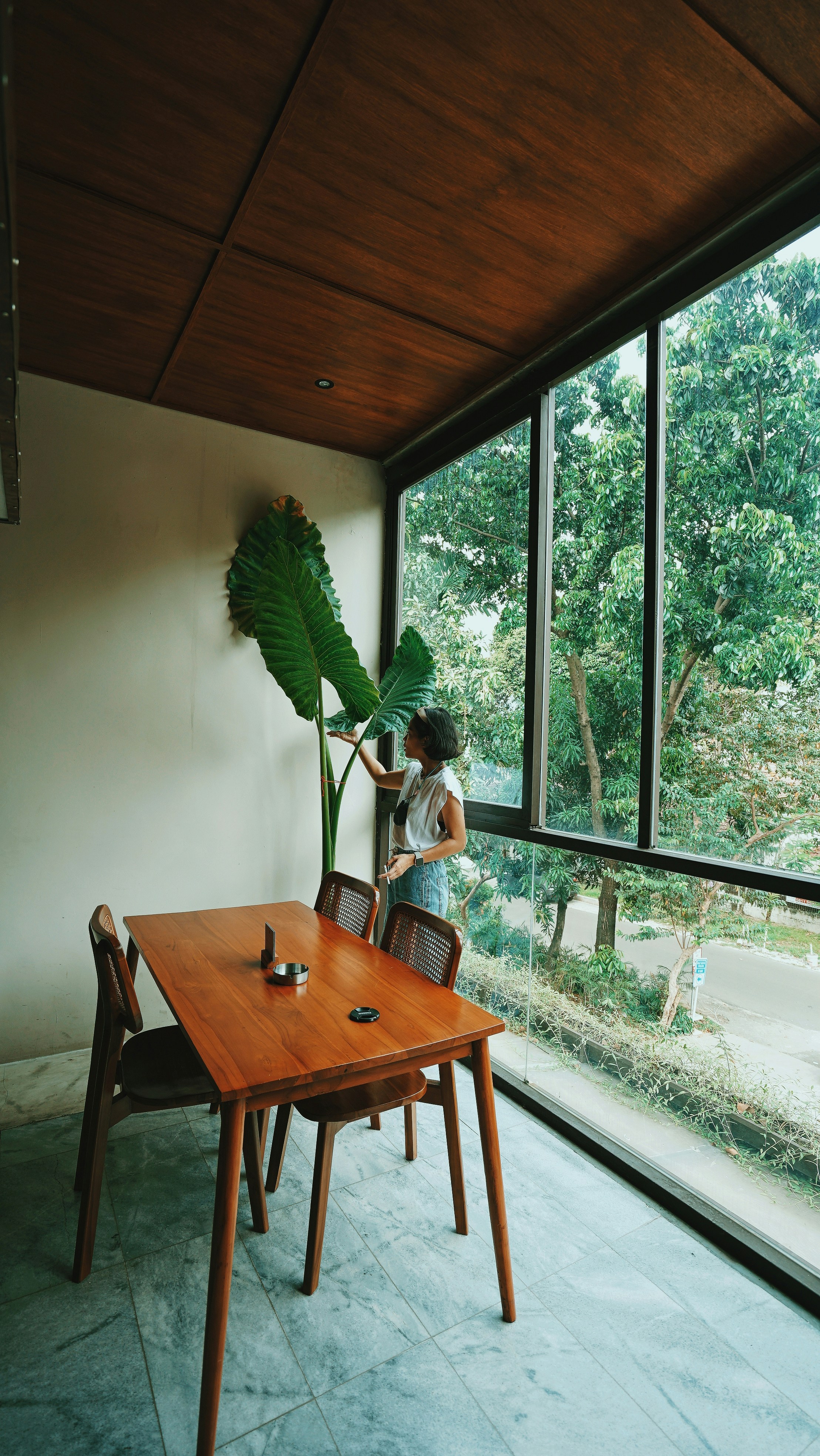 brown wooden table with chairs