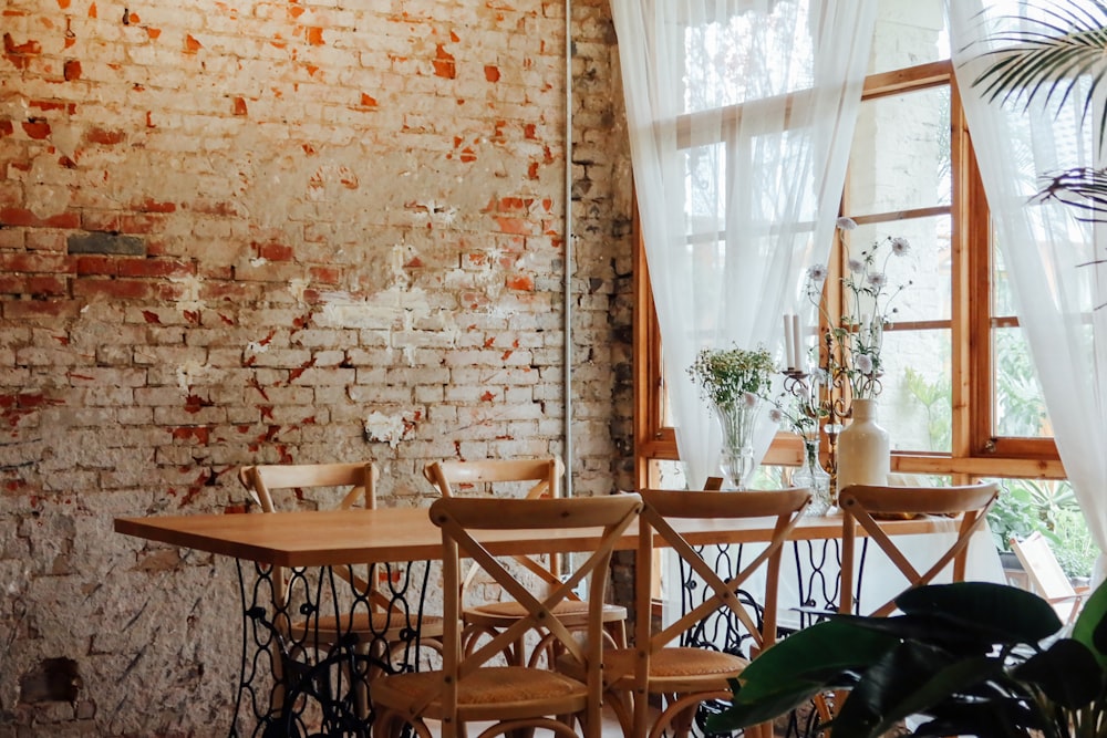 brown wooden table with chairs