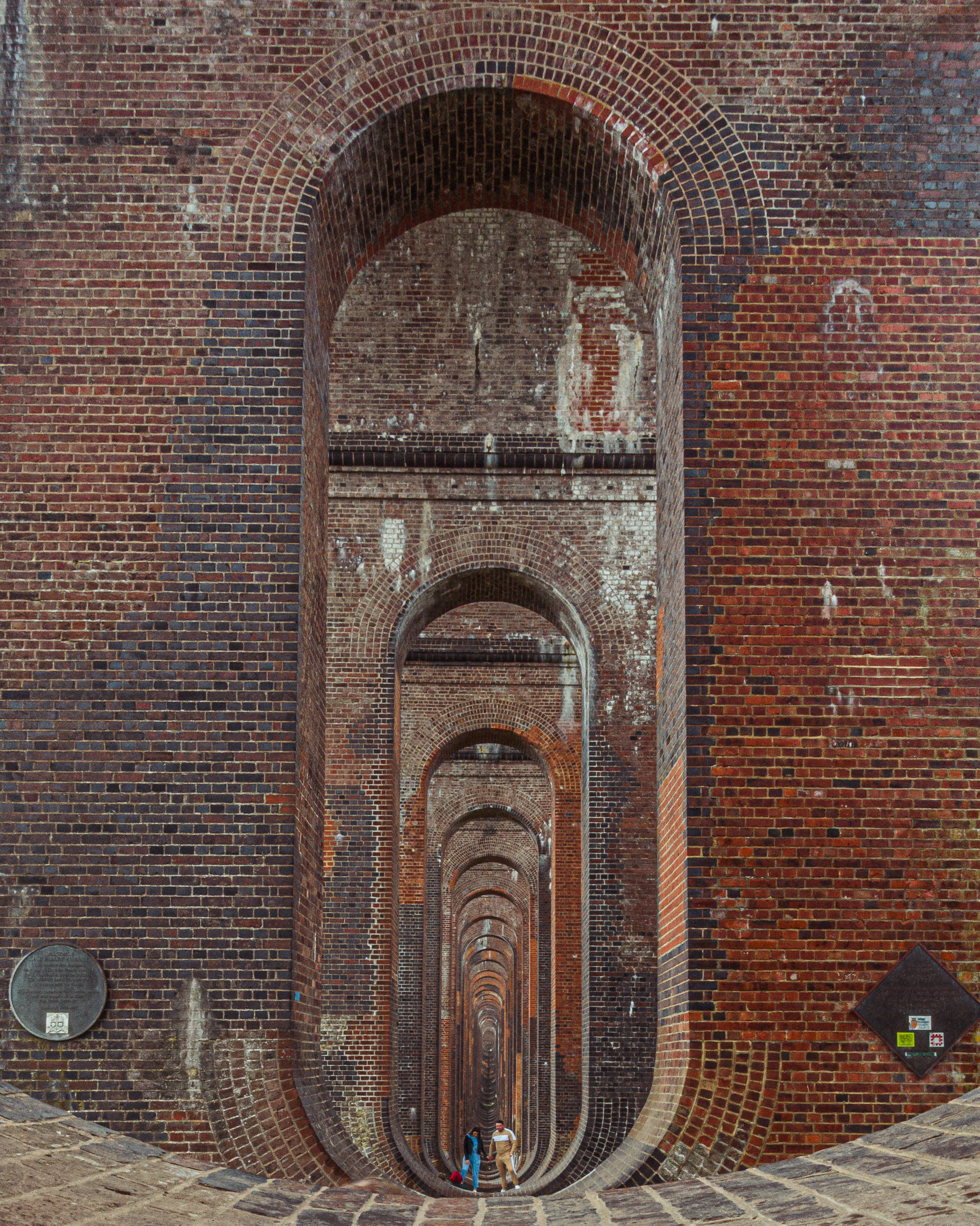 brown brick wall with brown brick wall