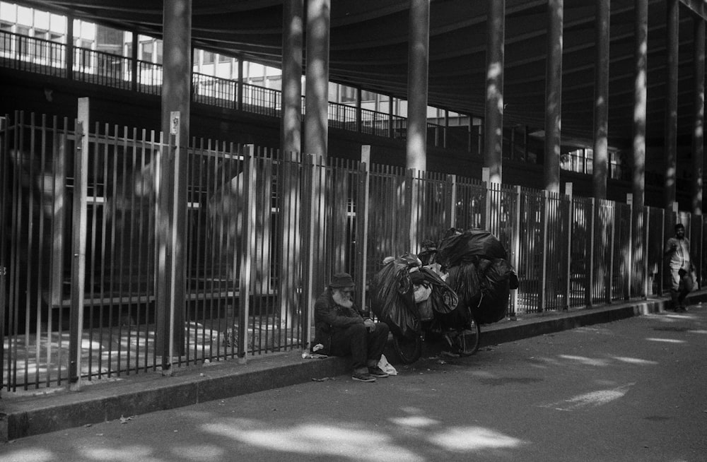 grayscale photo of horse carriage on road