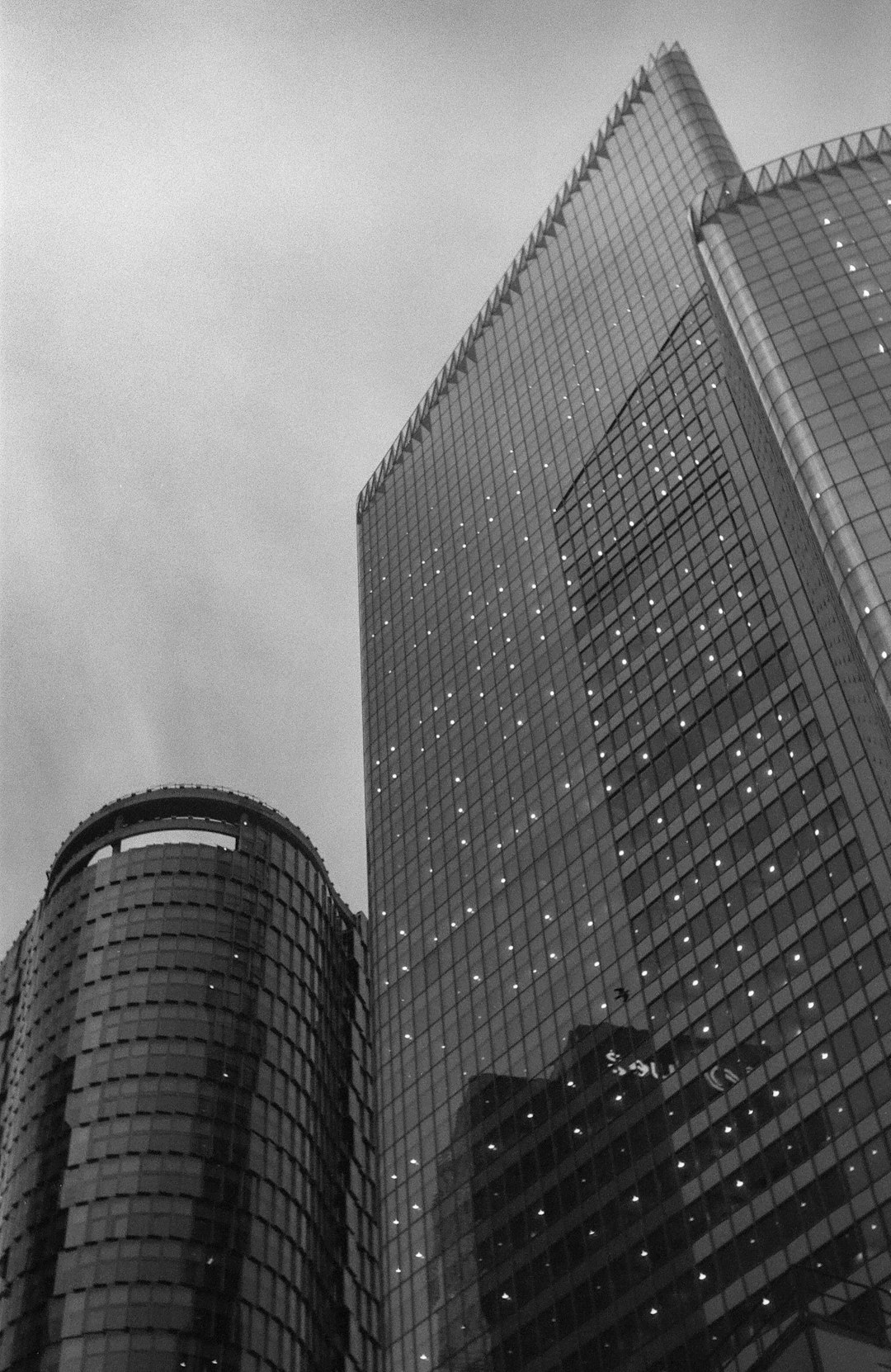 grayscale photo of high rise building