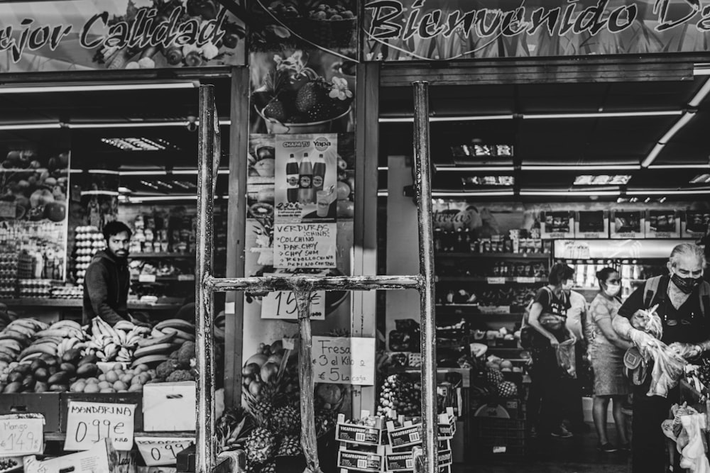 grayscale photo of store front