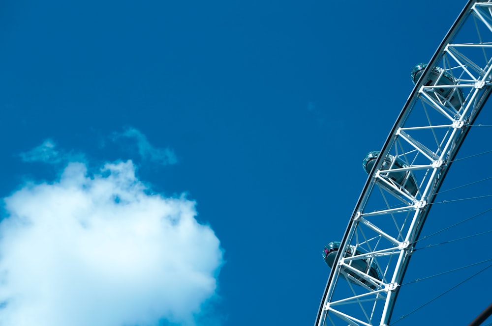 gray metal tower under blue sky