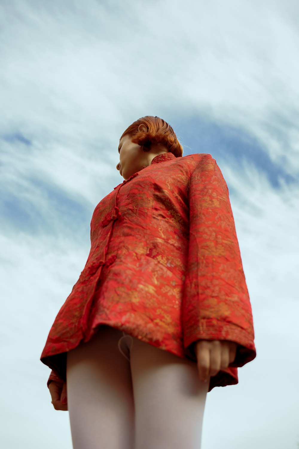 a statue of a woman in a red dress