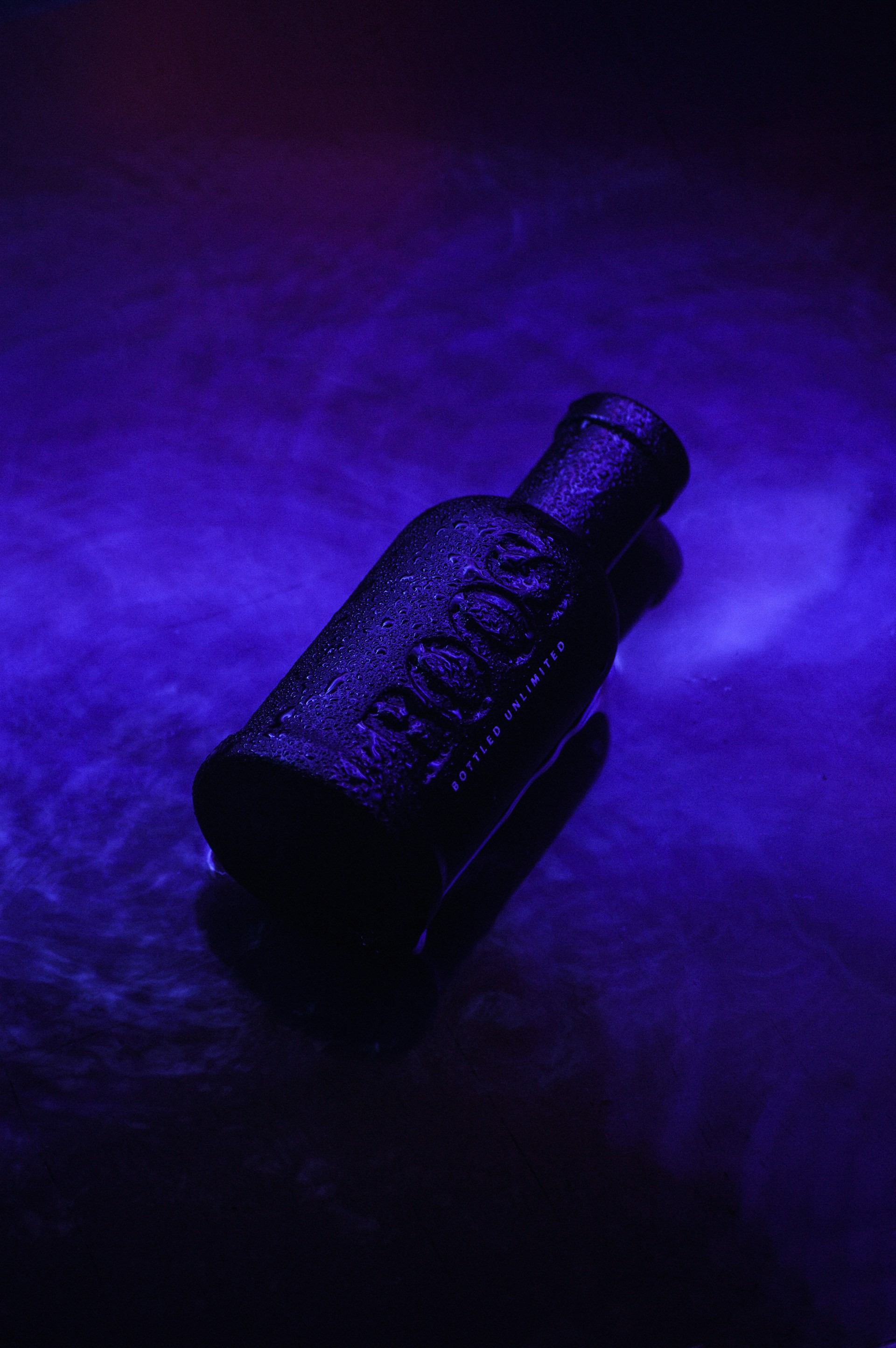 black metal pipe on purple textile