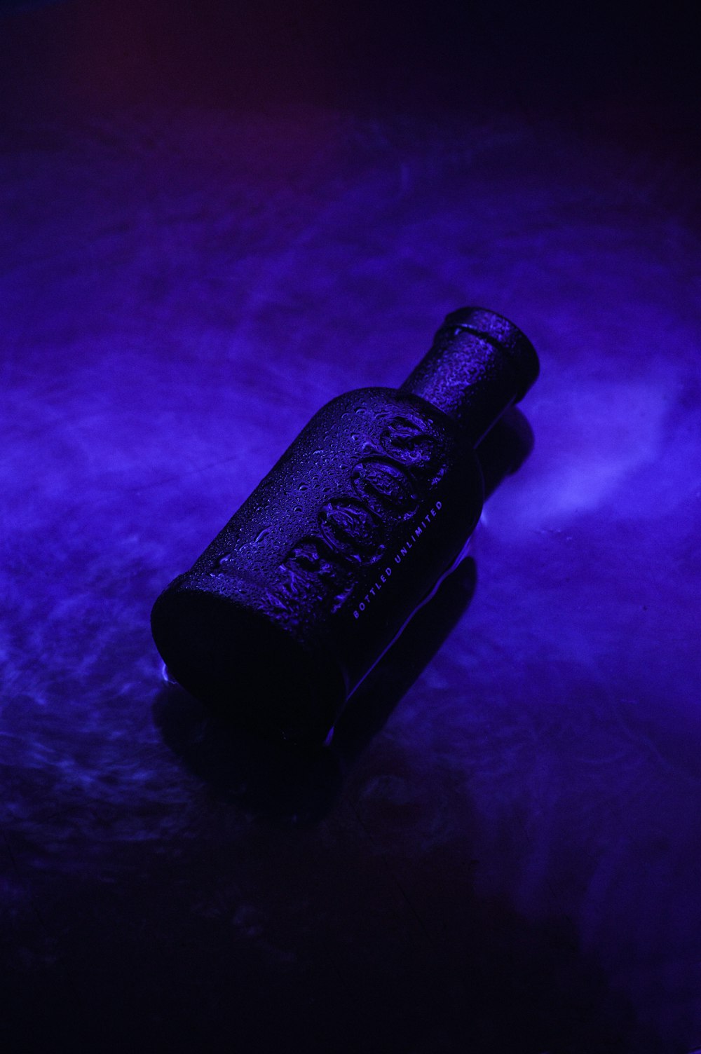black metal pipe on purple textile