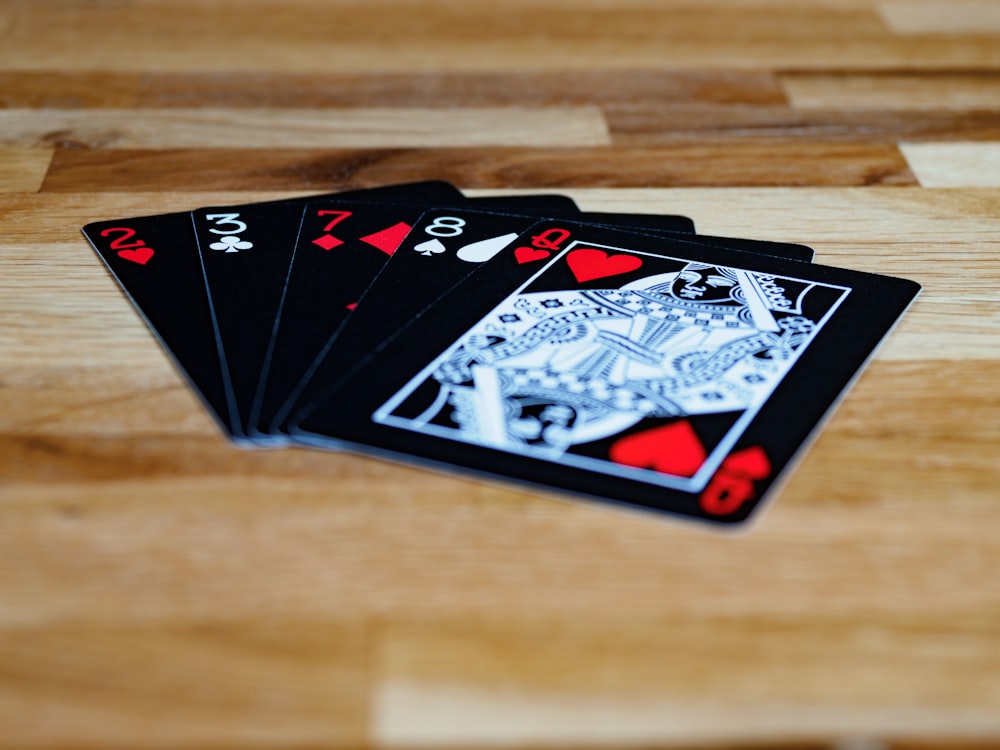 black white and red playing card