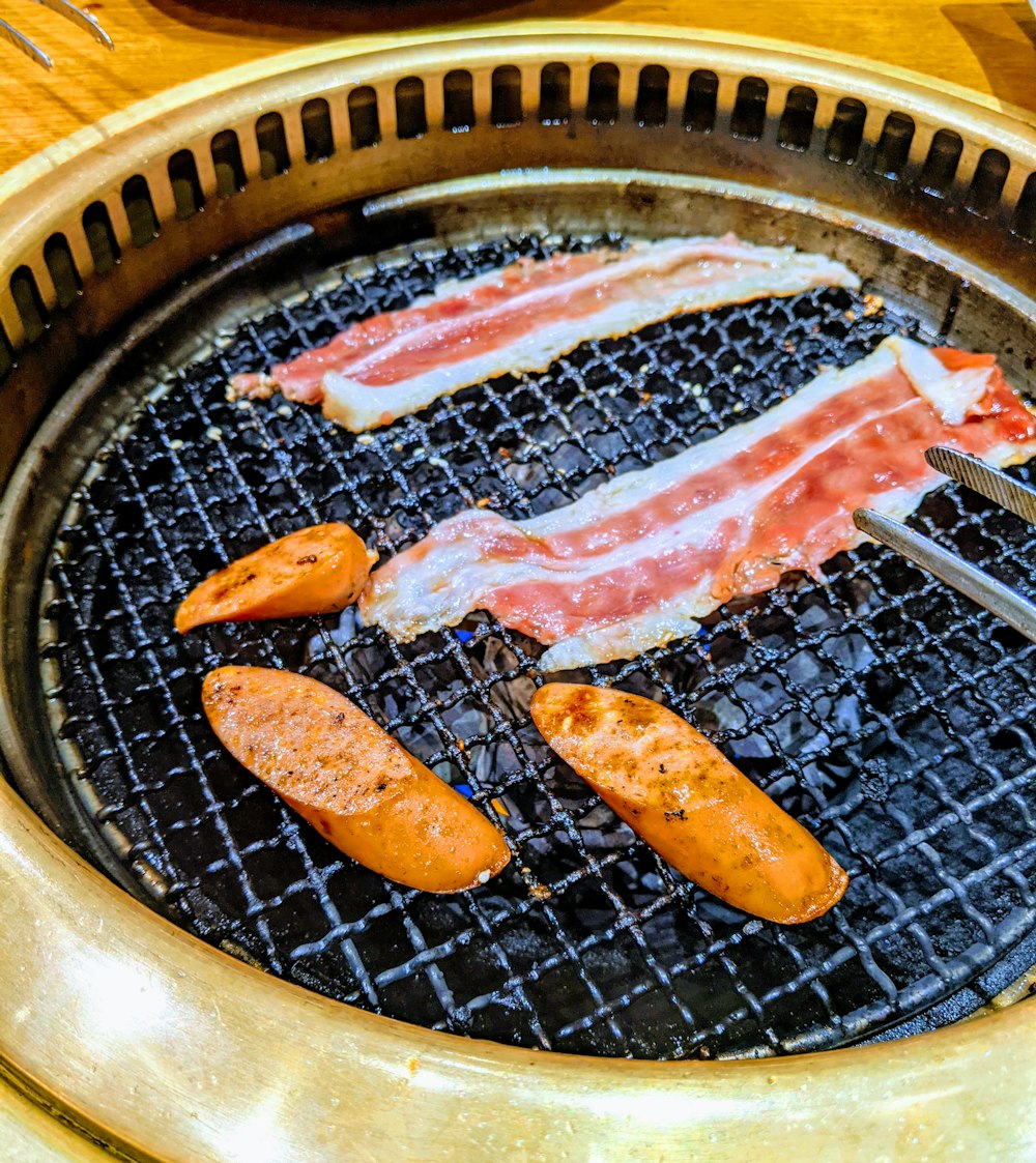 orange fish on black round pan