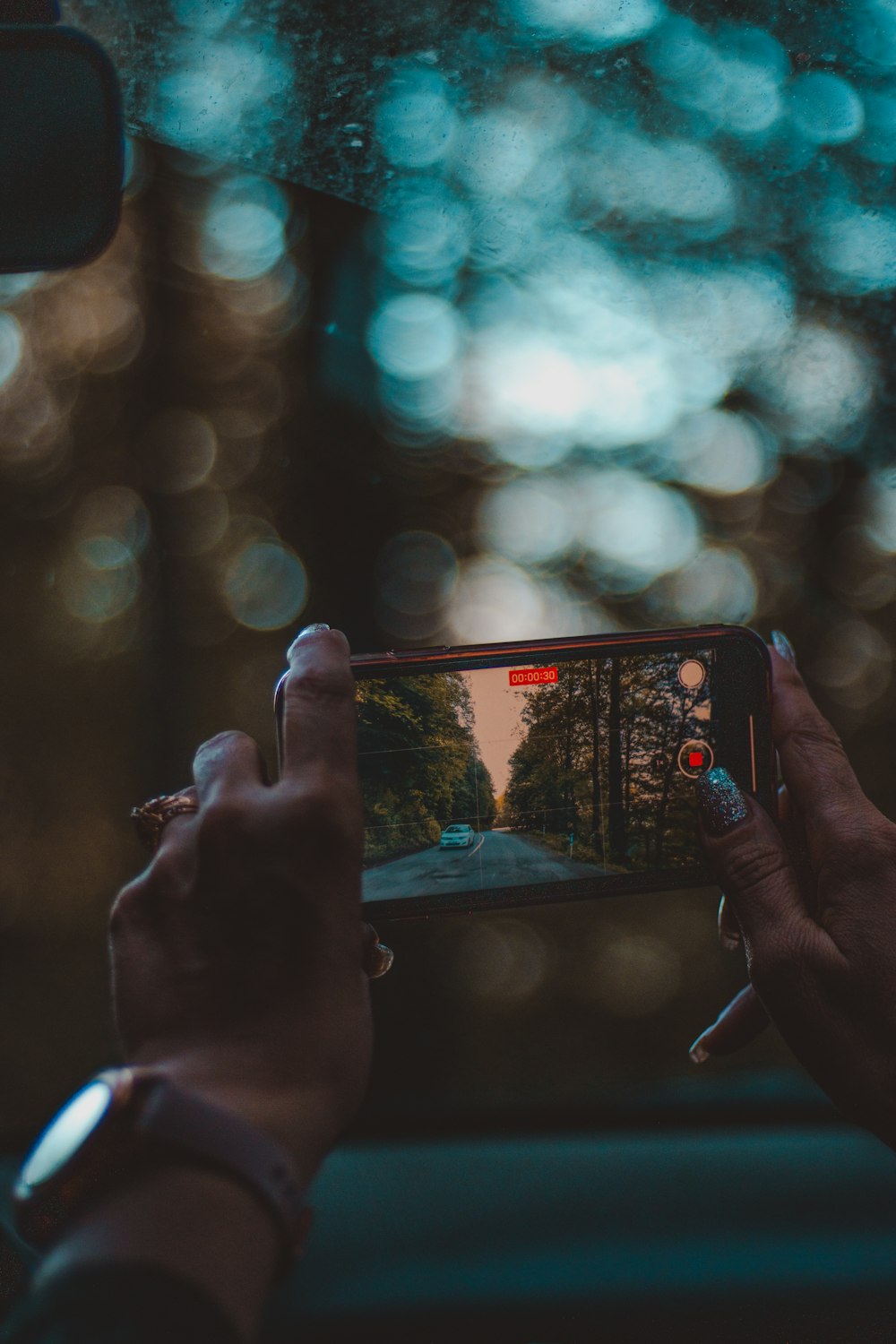 person holding black android smartphone