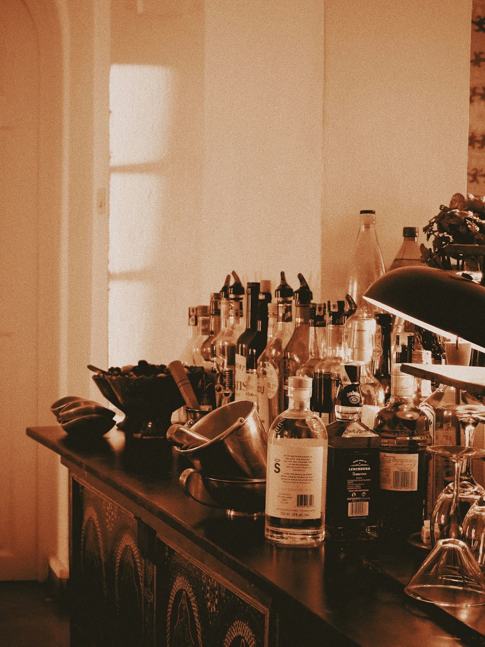 wine bottles on brown wooden table