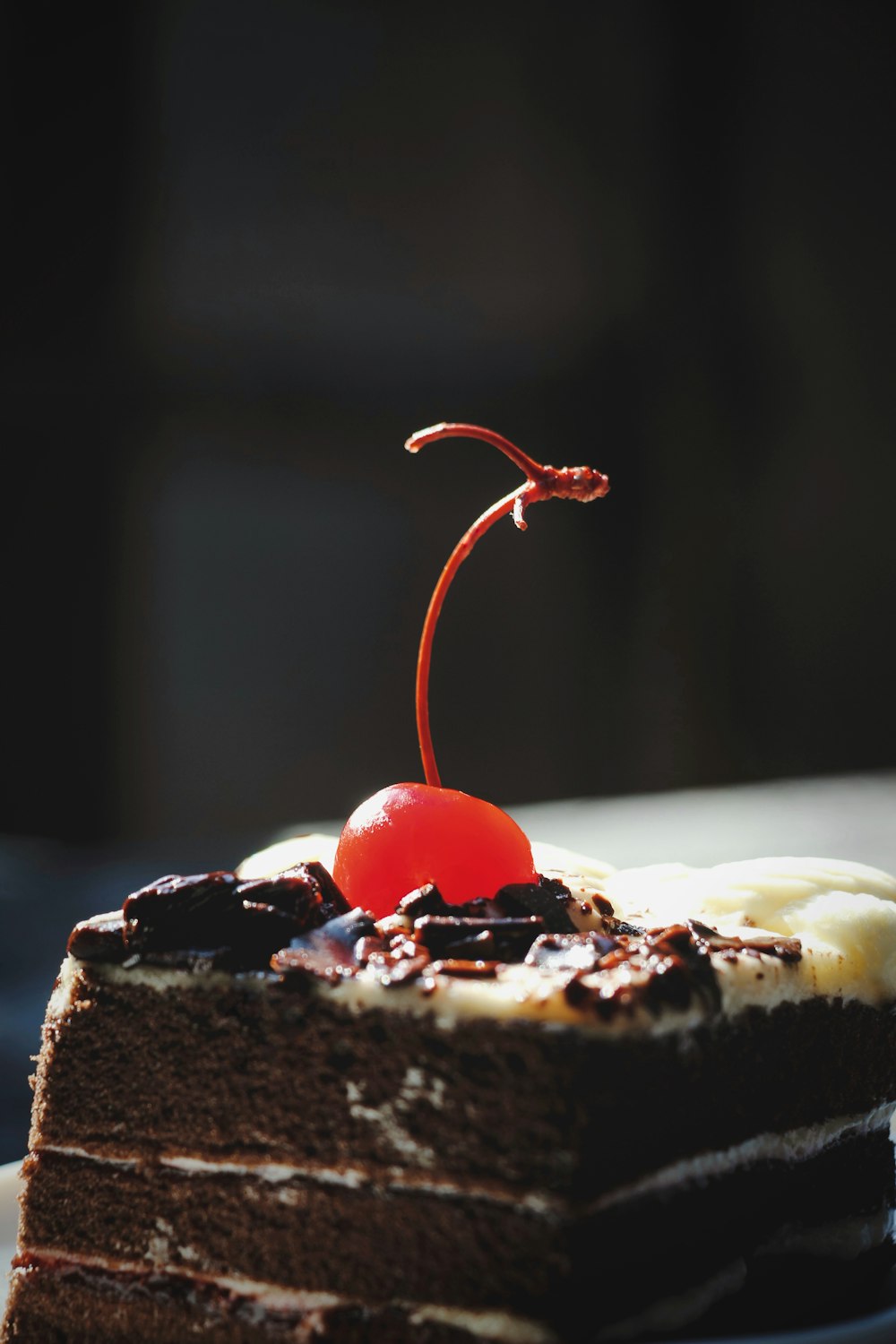 chocolate cake with cherry on top