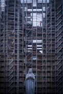 Detailed view of secured scaffolding with safety measures.