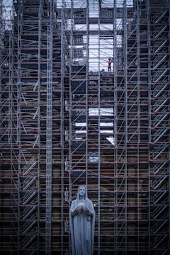 Detailed view of secured scaffolding with safety measures.
