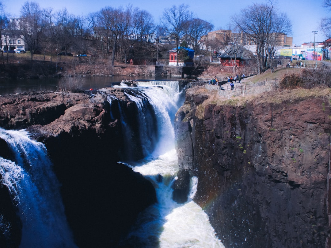 water falls on rocky mountain