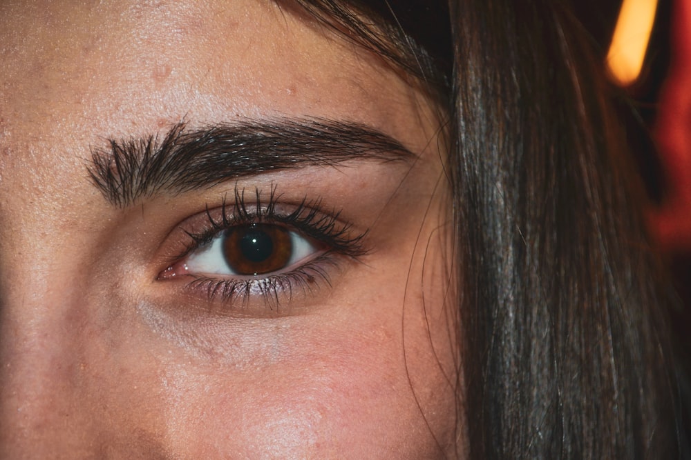 woman with black hair and blue eyes