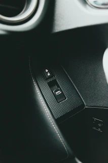 Detail of dashboard and door panel surfaces, spotless and matte-finished.