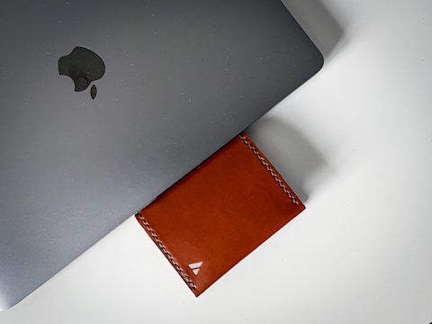 A close-up of a trademark certificate beside a laptop.