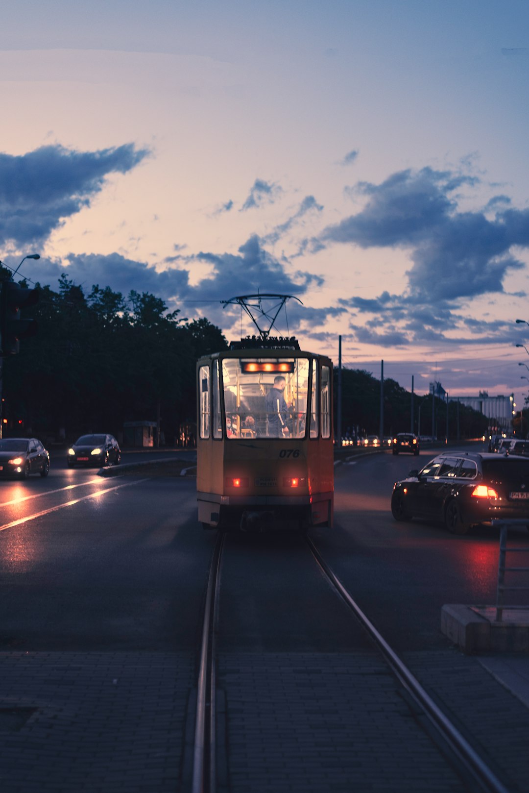 white and black tram on road during daytime