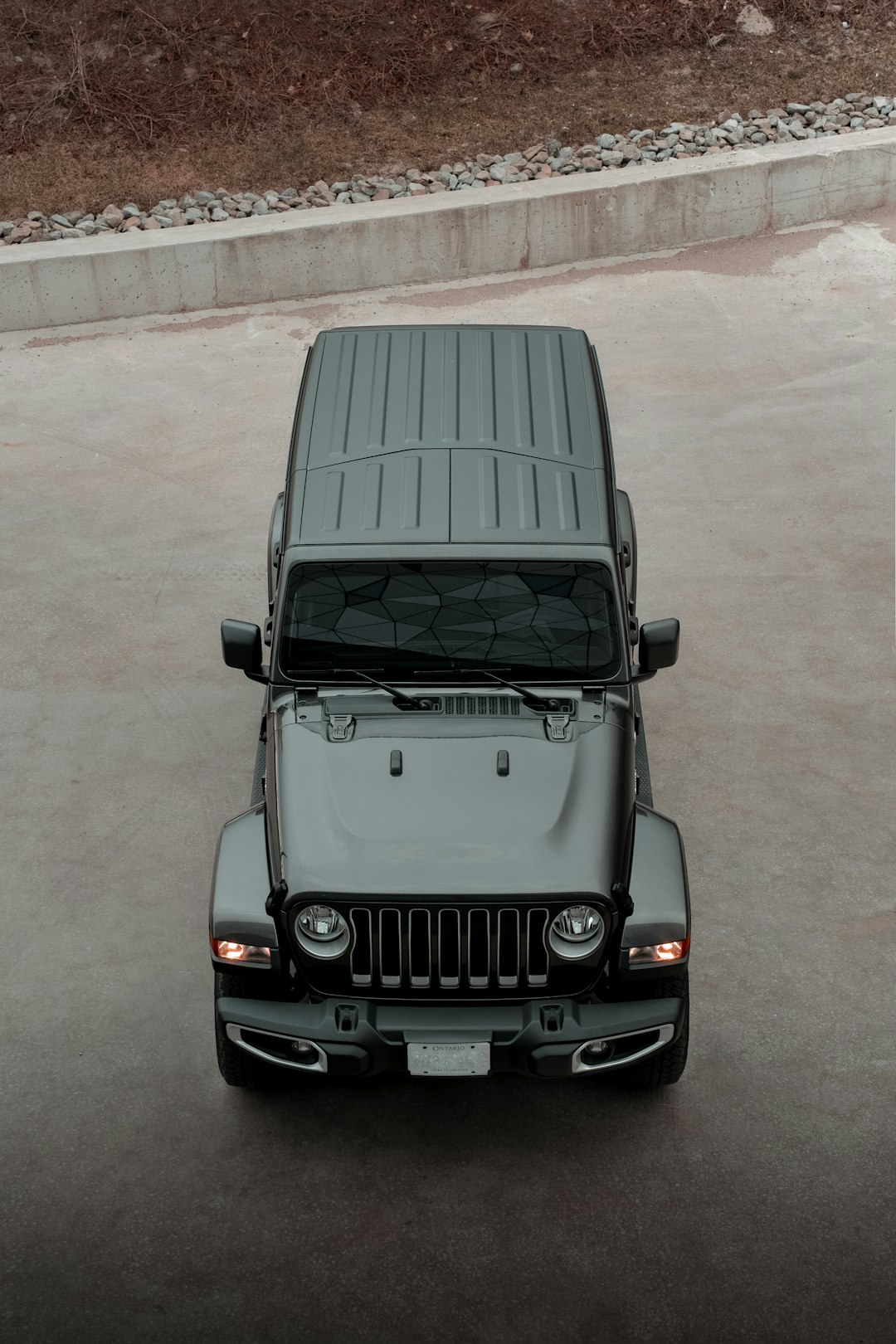 black mercedes benz g class on gray concrete road