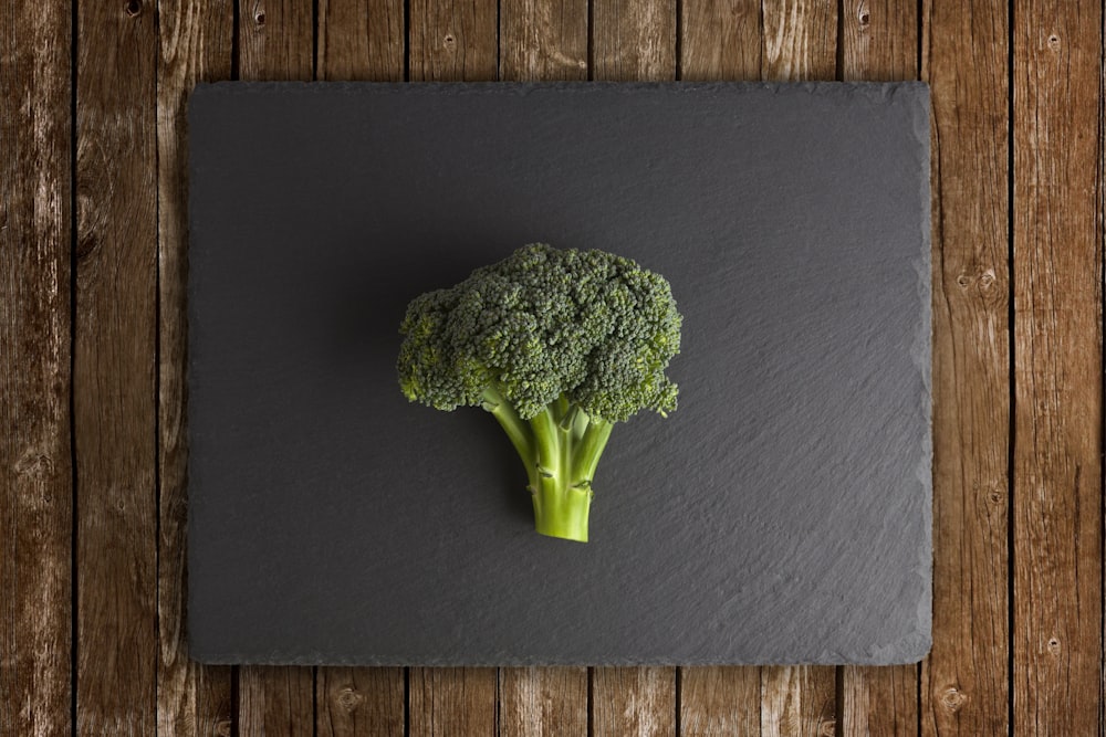 green broccoli on black surface