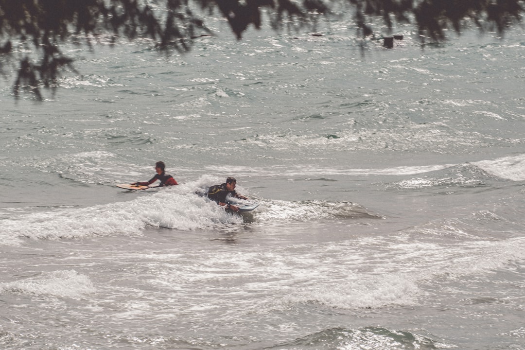 person surfing on water during daytime