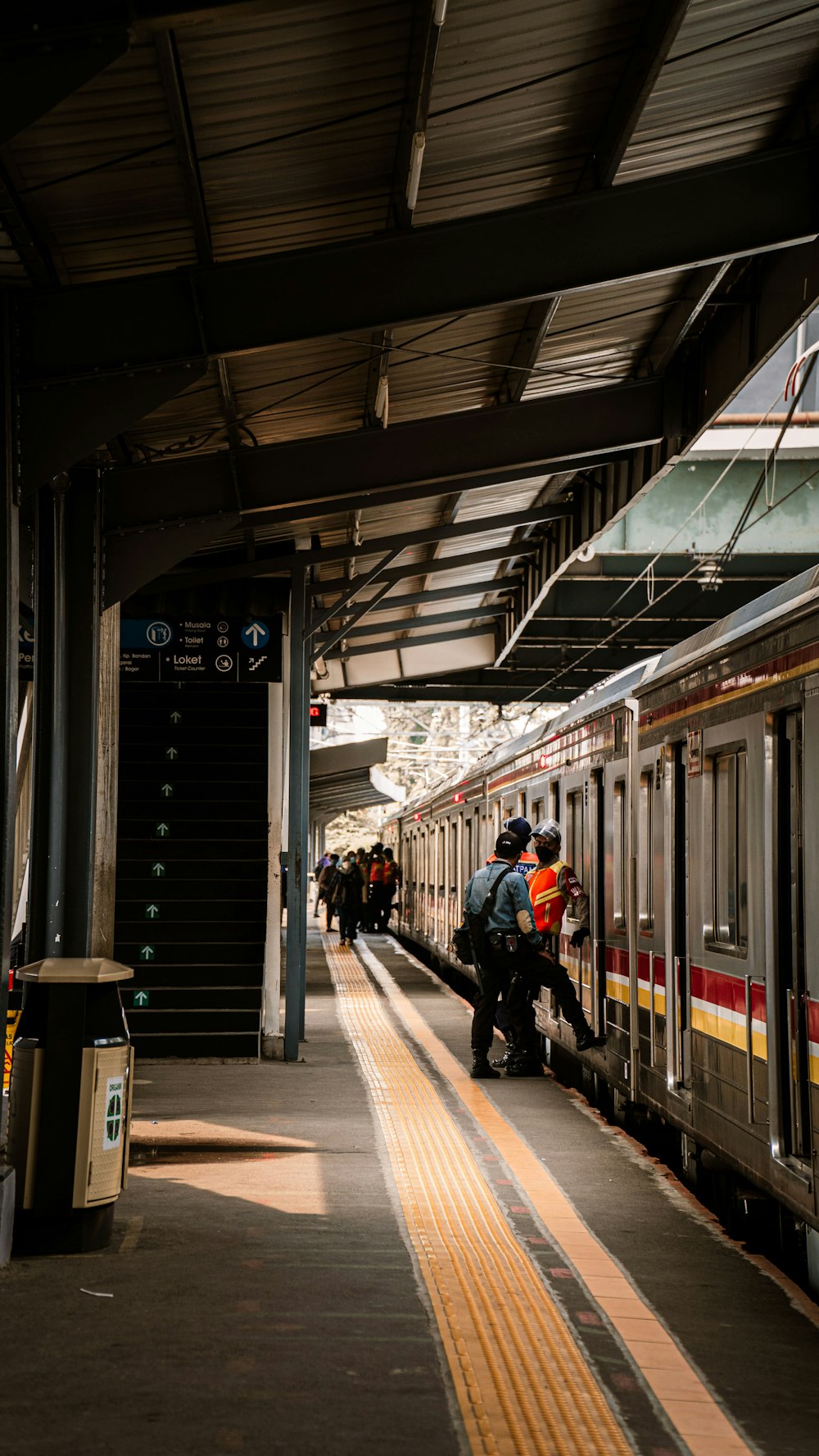 people in train station during daytime