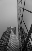 grayscale photo of high rise buildings