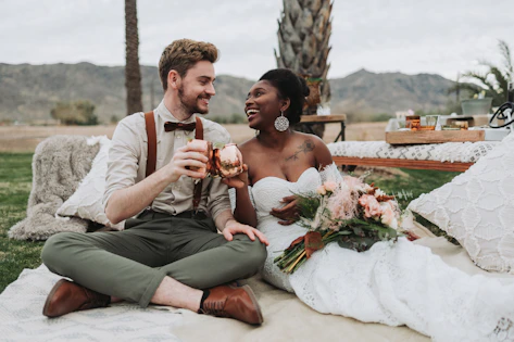A happy couple celebrates together on their wedding day.