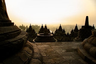 A serene view of Maa Kamakhya temple entrance bathed in soft morning light.